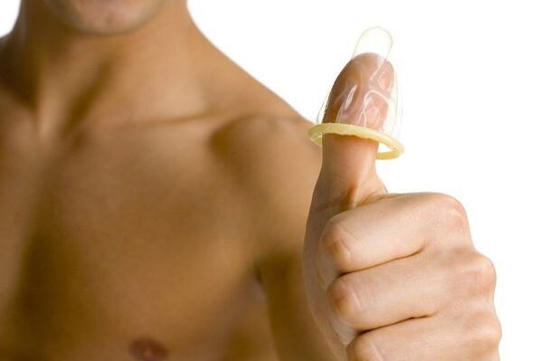 the condom on the finger symbolizes the enlargement of the teenager's penis